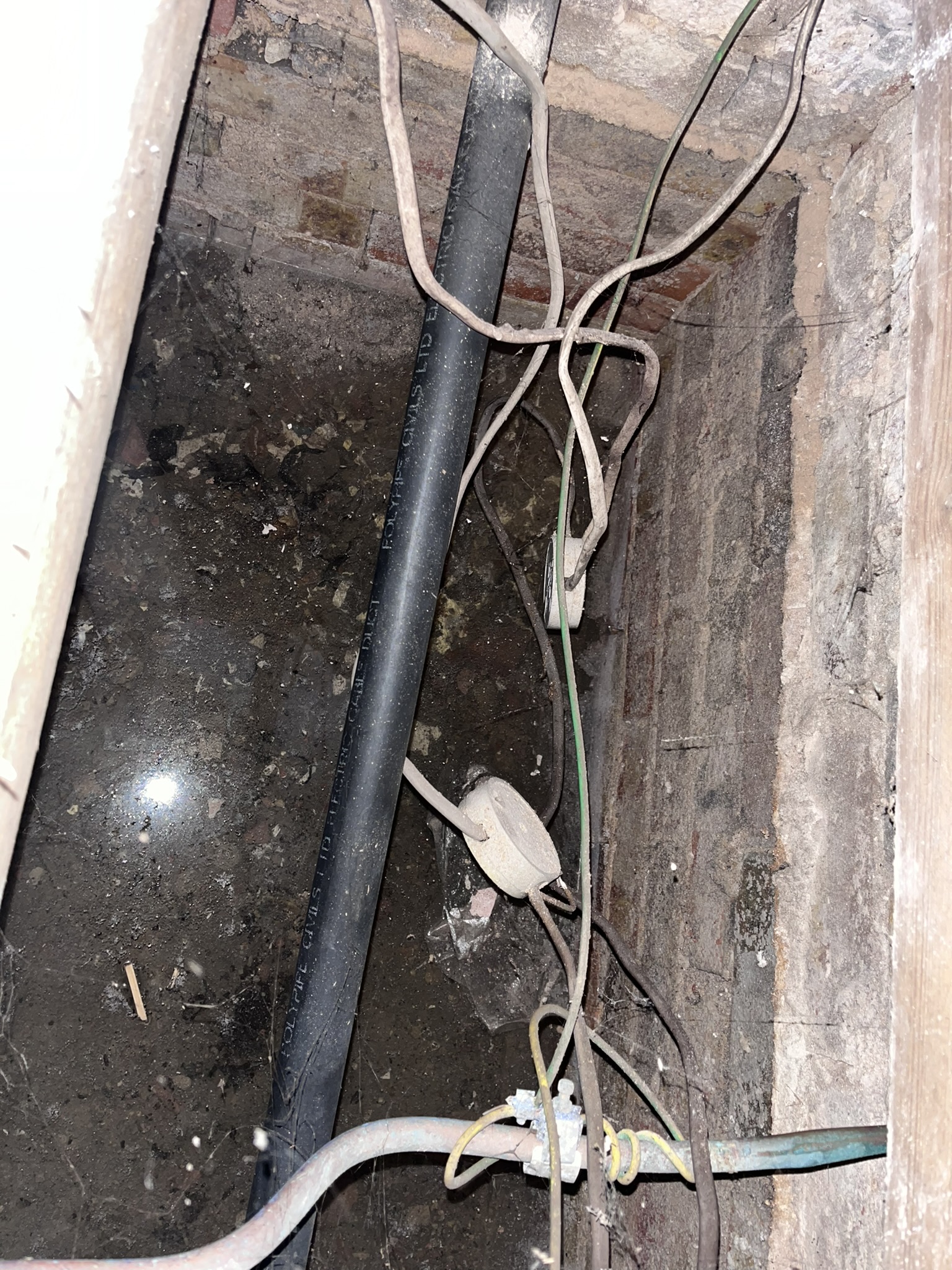 Cables loose and free to hang just inches from ground water